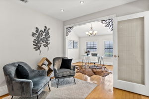 Sitting area and flex space next to the living room