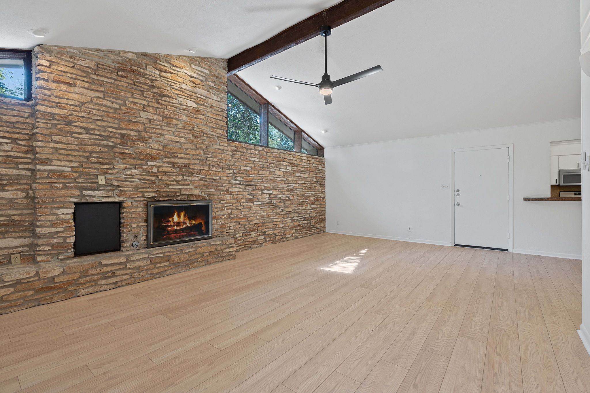 Unit B Stone Feature Wall w/ Fireplace