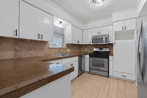 Unit B Kitchen w/ Granite and Stainless