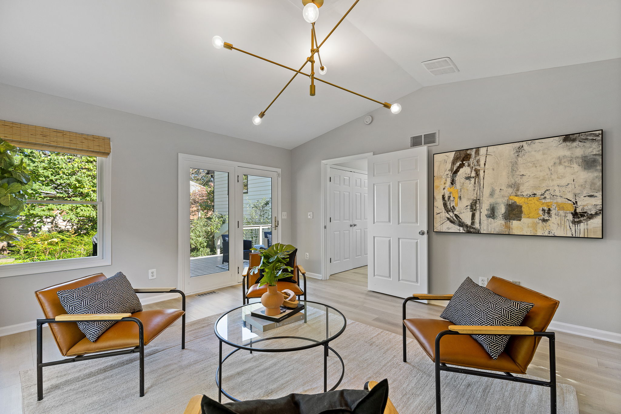 Sun room addition with vaulted ceiling