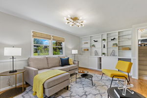 Expansive lower lvl family room with built-ins