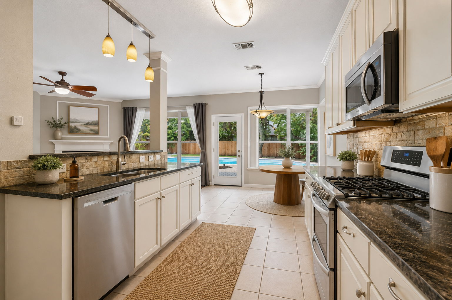 Modern farmhouse kitchen with pool view