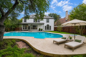 Peaceful suburban backyard with pool