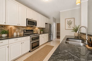 Modern galley kitchen with neutral tones