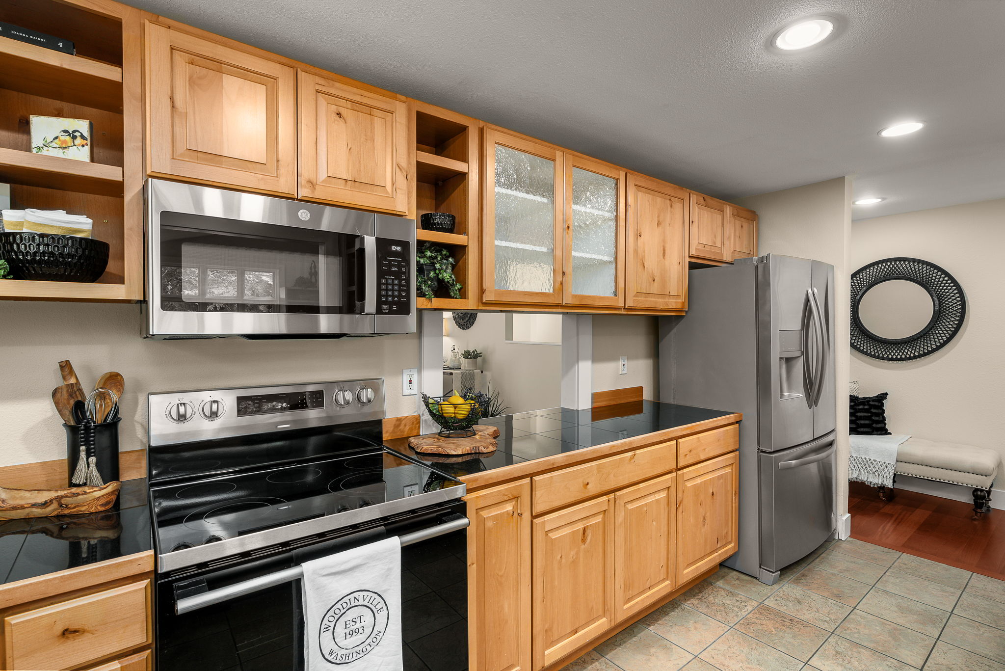 Functional kitchen with updated appliances and generous workspace.