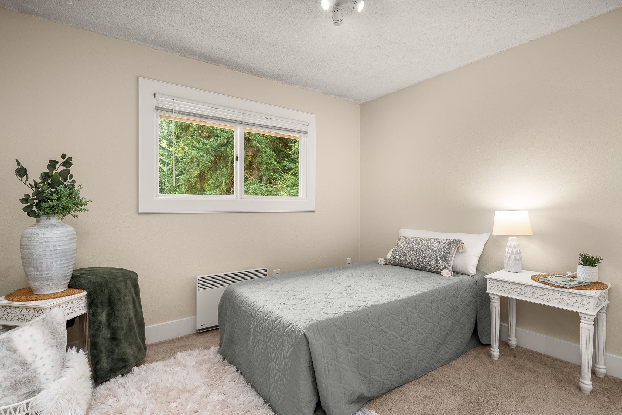 Main-level bedroom with flexible possibilities.