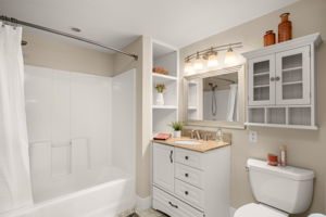 Bonus space adjacent to a full bath offers potential for a larger primary retreat.