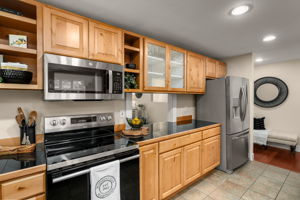 Functional kitchen with updated appliances and generous workspace.