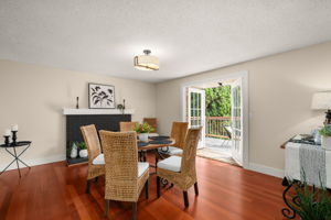 Wood-burning fireplace and a view of the private acreage.