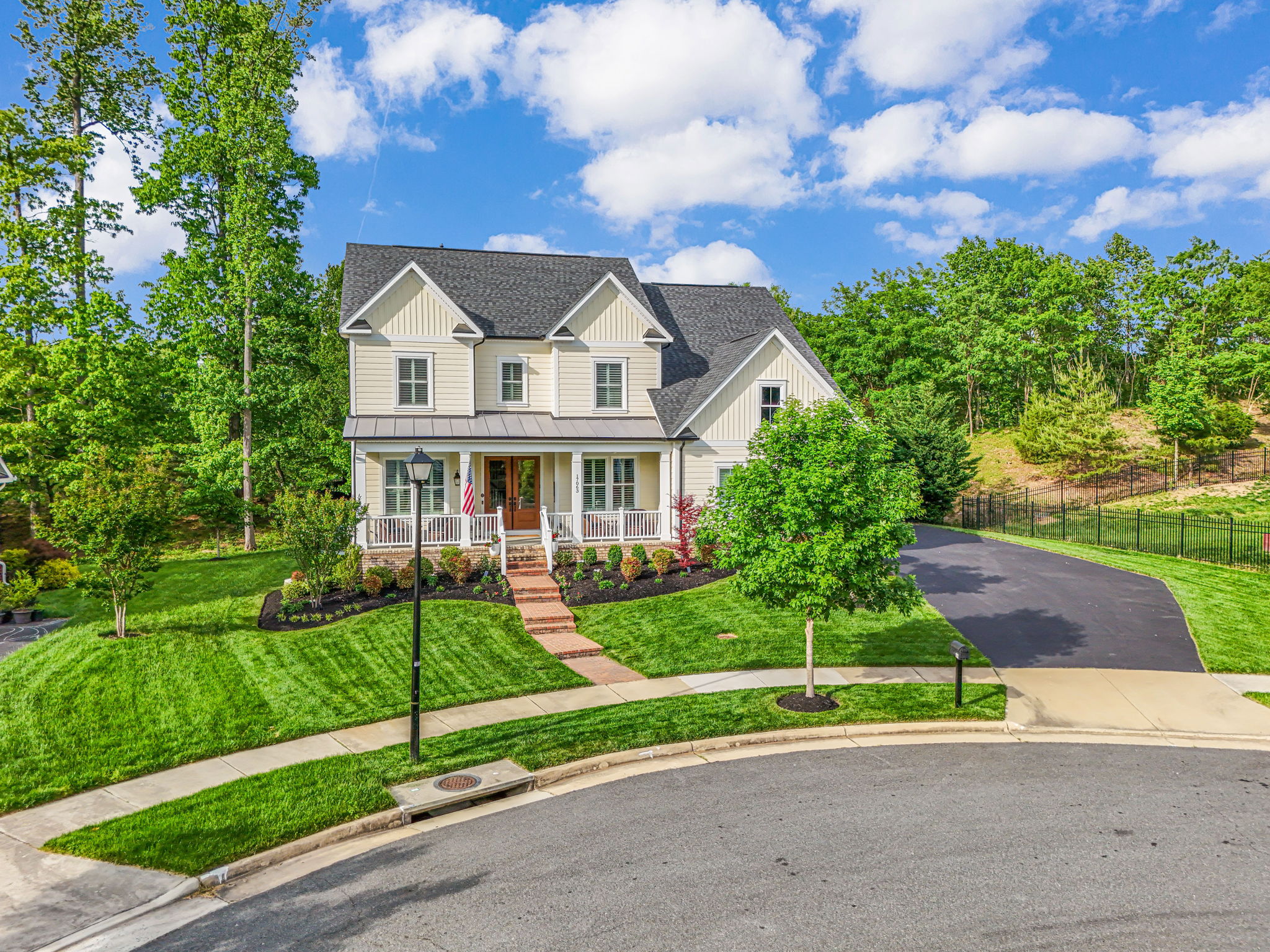Right out of a story book!!! Beautifully manicured lawn.