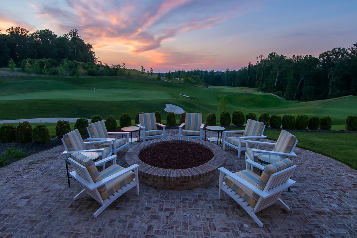 Enjoy gathering around the firepit on the Tidewater Grill patio