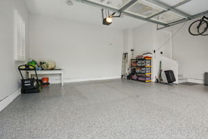 With a TRUE 3-car FINISHED garage.