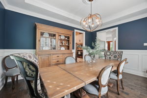 Notice the double crown molding and wainscoting