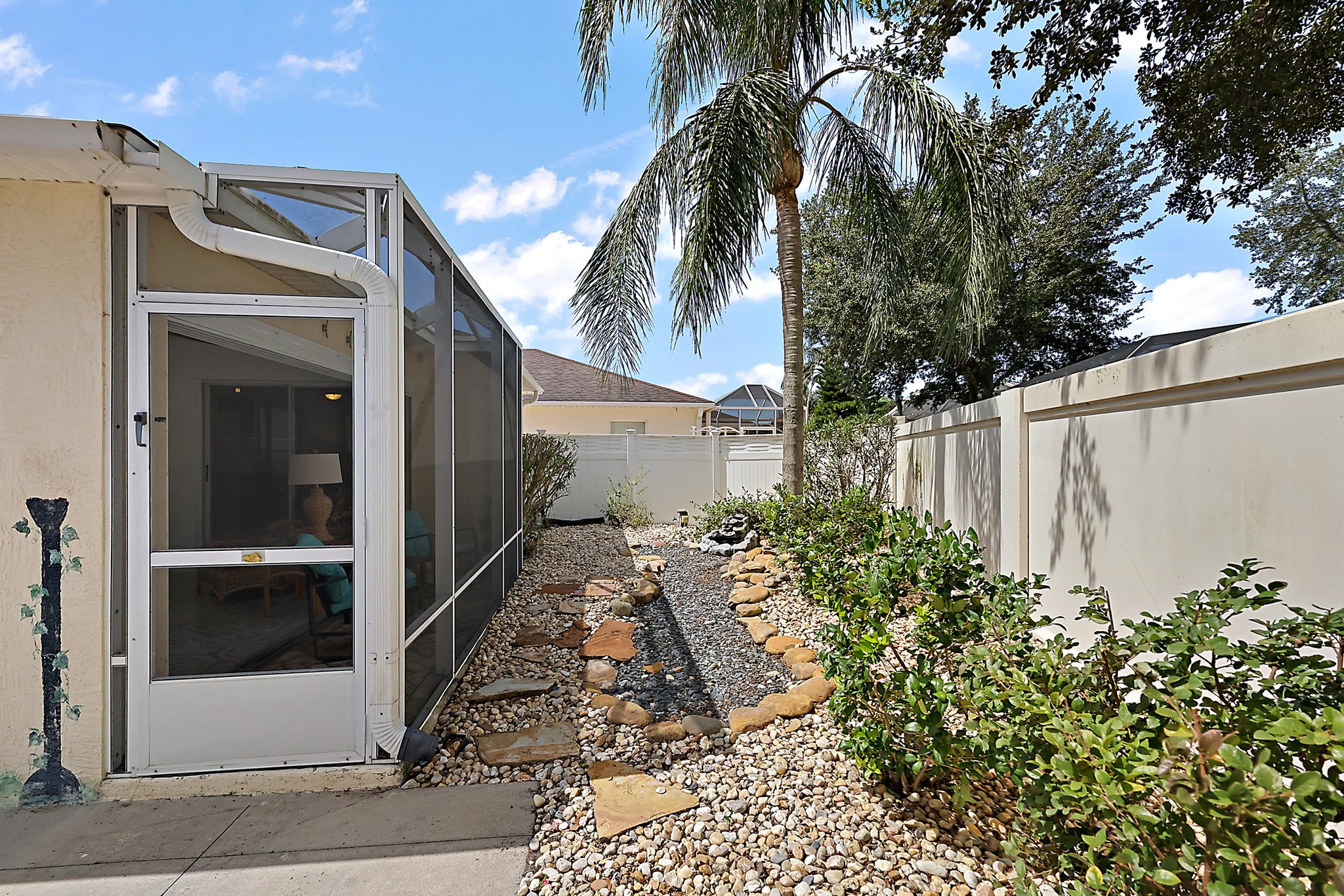 Rear Stoned Yard with Water Feature