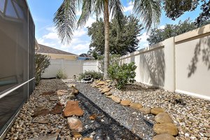 Rear Stoned Yard with Water Feature