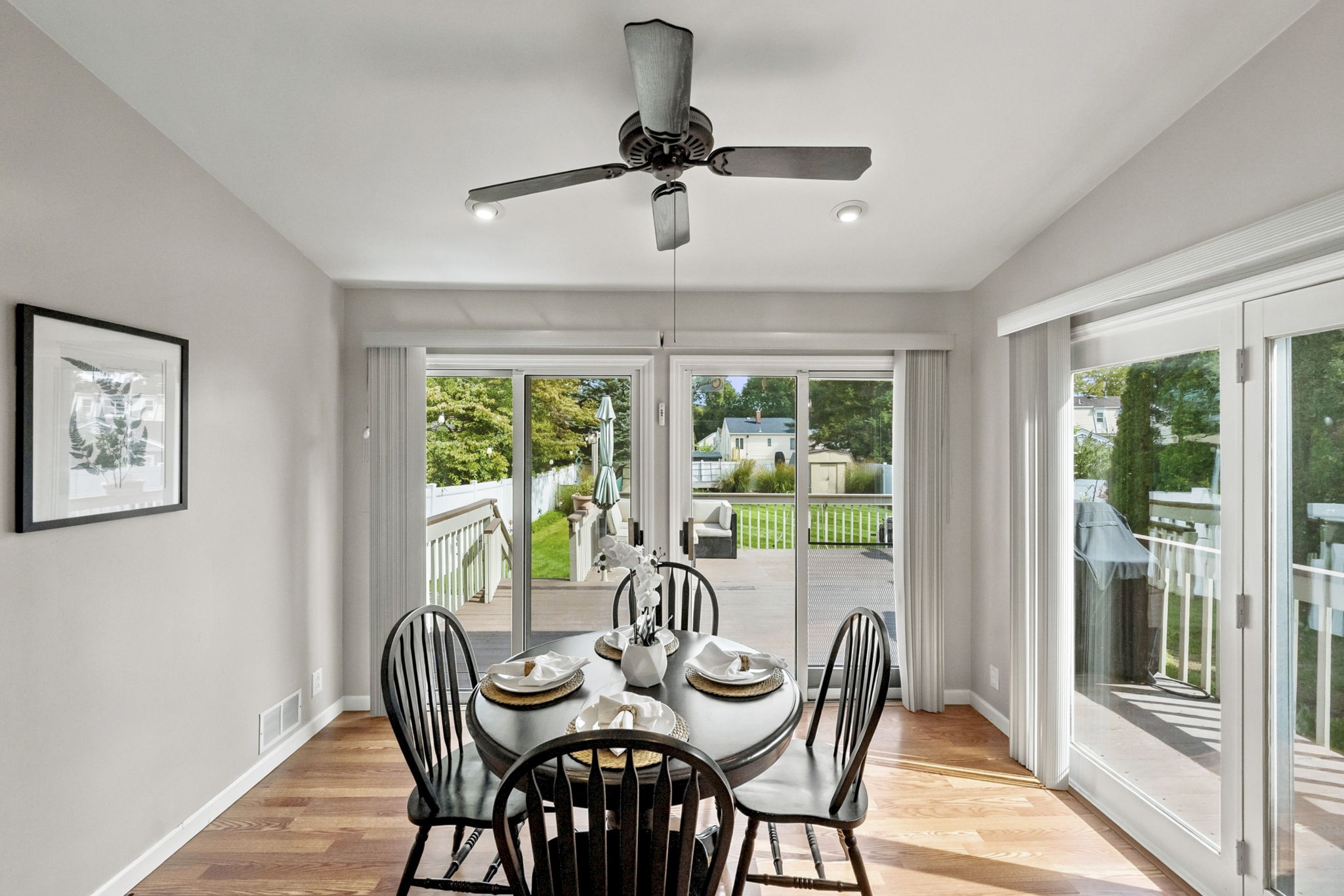 the kitchen addition opens directly to the spacious dining area created by the rear dormer. There’s generous counter space, an island for prep and room to gather around the table. When the weather is nice, open the two sliders and take the gathering outside.