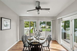 the kitchen addition opens directly to the spacious dining area created by the rear dormer. There’s generous counter space, an island for prep and room to gather around the table. When the weather is nice, open the two sliders and take the gathering outside.