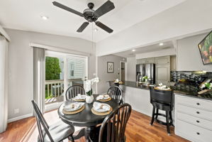 the kitchen addition opens directly to the spacious dining area created by the rear dormer. There’s generous counter space, an island for prep and room to gather around the table. When the weather is nice, open the two sliders and take the gathering outside.