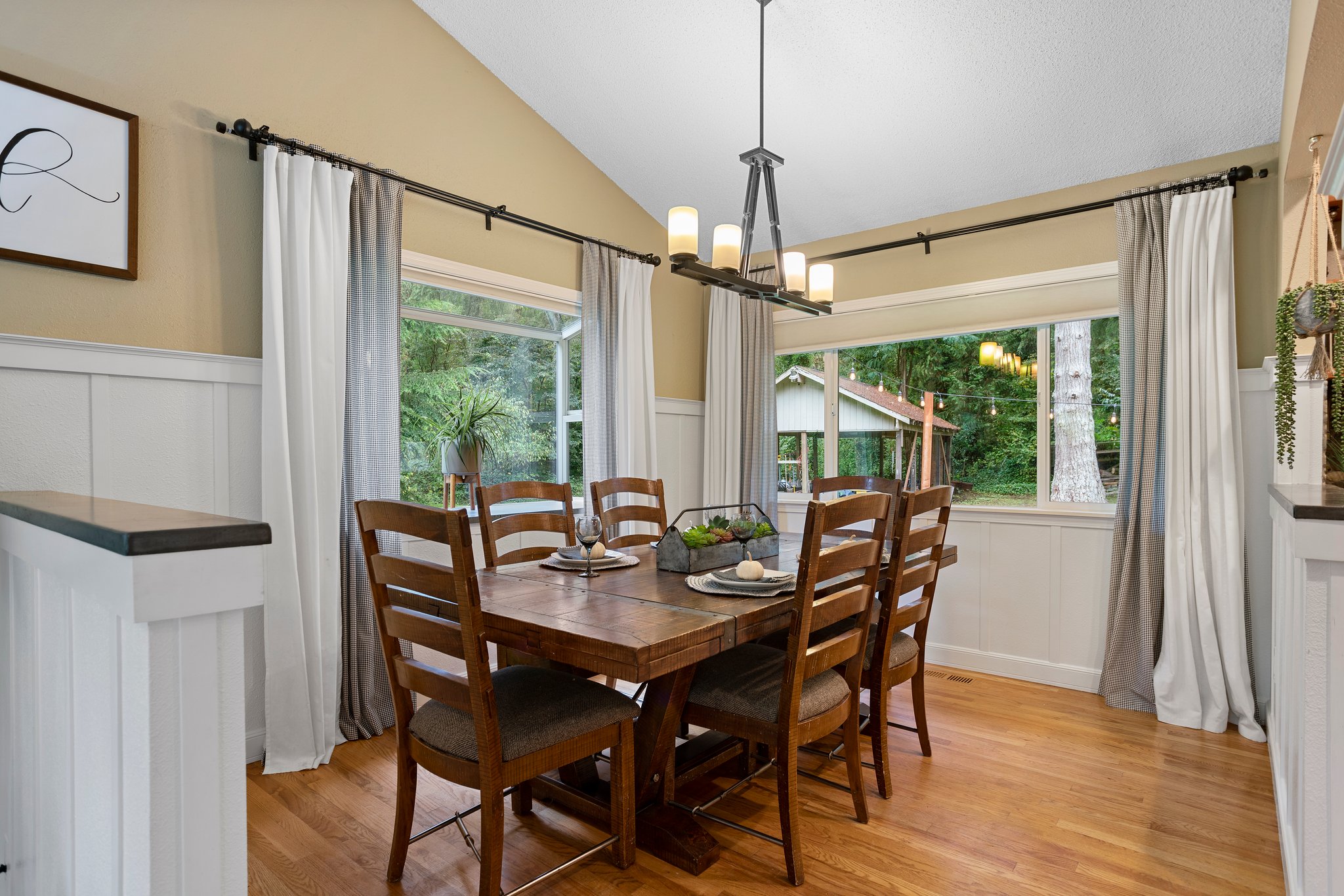 Custom Board & Batten style walls throughout home and attention to detail in your gorgeous dining room!