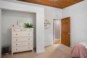 Large closet. Use it for a desk, dresser or seller has closet organizers to add if desired. All doors are solid wood 6 panelled doors throughout the home!