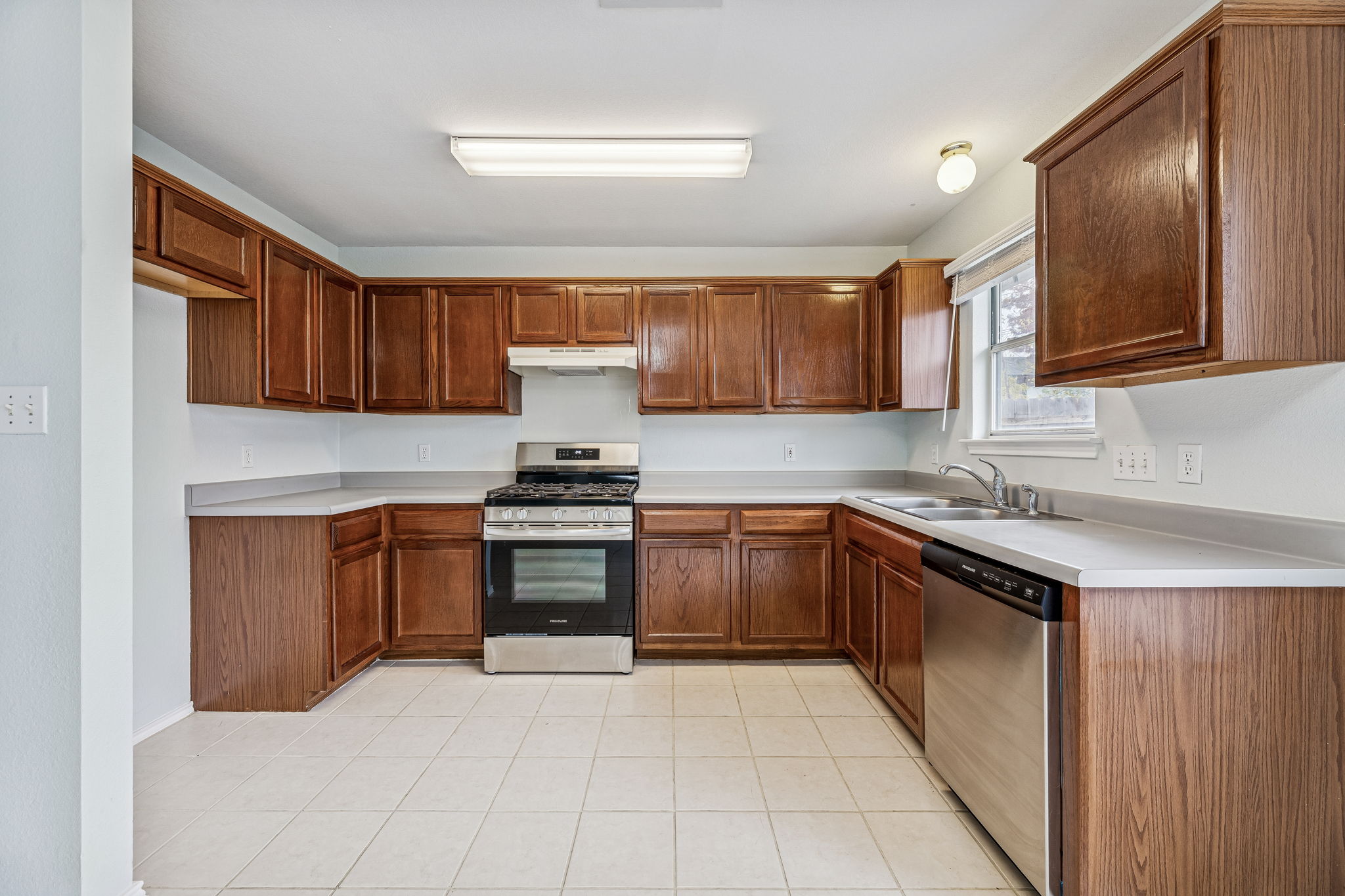 New stove & dishwasher, cabinets were recently refinished.