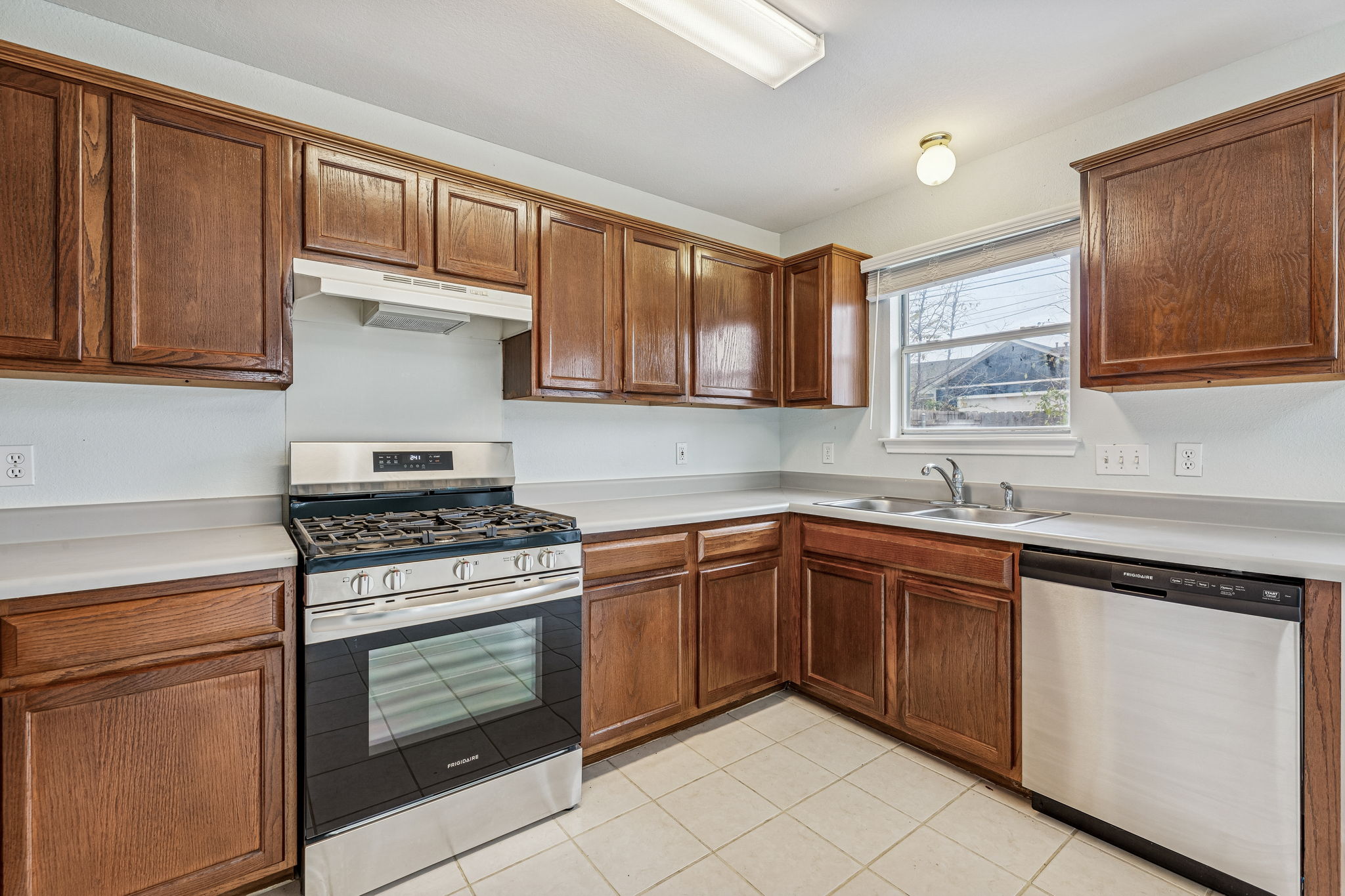 New stove & dishwasher, cabinets were recently refinished.