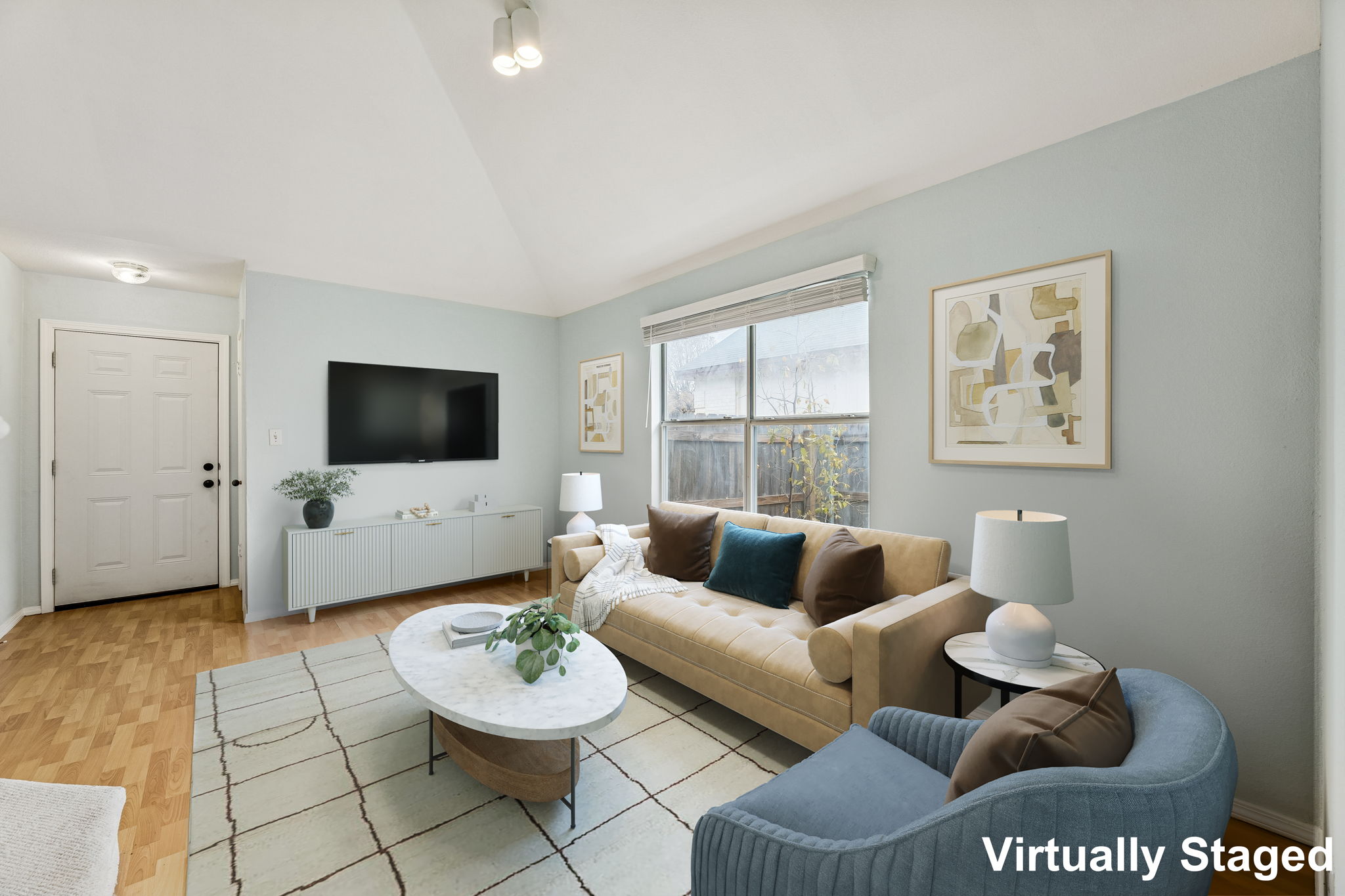 This secondary living room at the front of the house is perfect for a comfortable sitting area, musical instruments, a reading area, or a flex space for whatever you want.