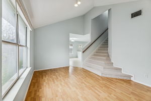 This secondary living room at the front of the house is perfect for a comfortable sitting area, musical instruments, a reading area, or a flex space for whatever you want.