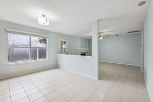 The main living area at the back of the house has a cozy gas fireplace that can also be enjoyed from the kitchen and dining room.