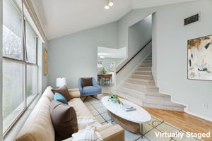 This secondary living room at the front of the house is perfect for a comfortable sitting area, musical instruments, a reading area, or a flex space for whatever you want.