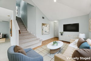 This secondary living room at the front of the house is perfect for a comfortable sitting area, musical instruments, a reading area, or a flex space for whatever you want.