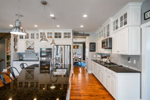Coastal upper glass cabinetry