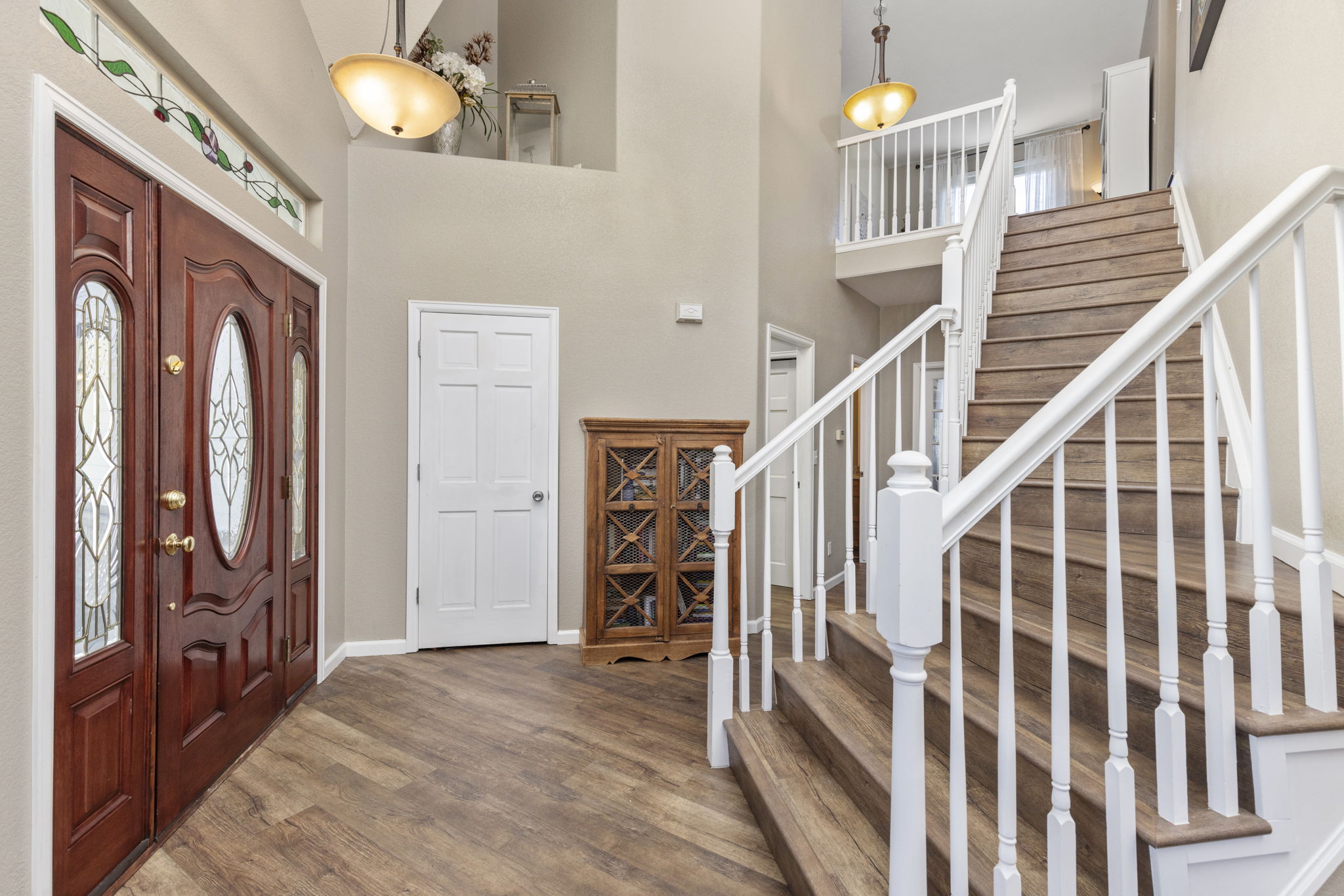 Inviting Entryway & graceful staircase
