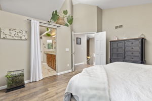 Primary bedroom. Vaulted ceilings, walk-in closet. Energy Star 3-pane windows