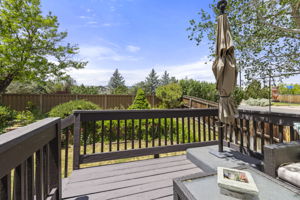 Delightful private backyard with 2-tier deck & mature vegetation. Peace & tranquility, no neighbors behind!