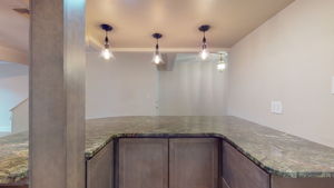Granite-topped Eat-in Bar and Prep Area