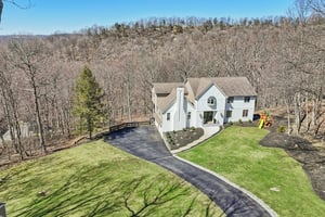 Driveway can accomodate 15 cars!