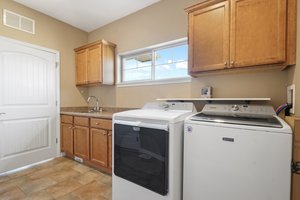 Large Laundry & Utility Room with Sink & Pantry