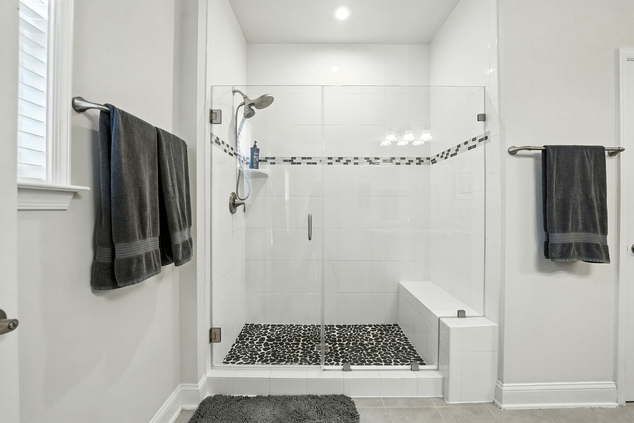 Walk-in shower with custom tile