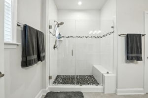 Walk-in shower with custom tile