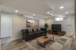 Virtually staged lower unit family room