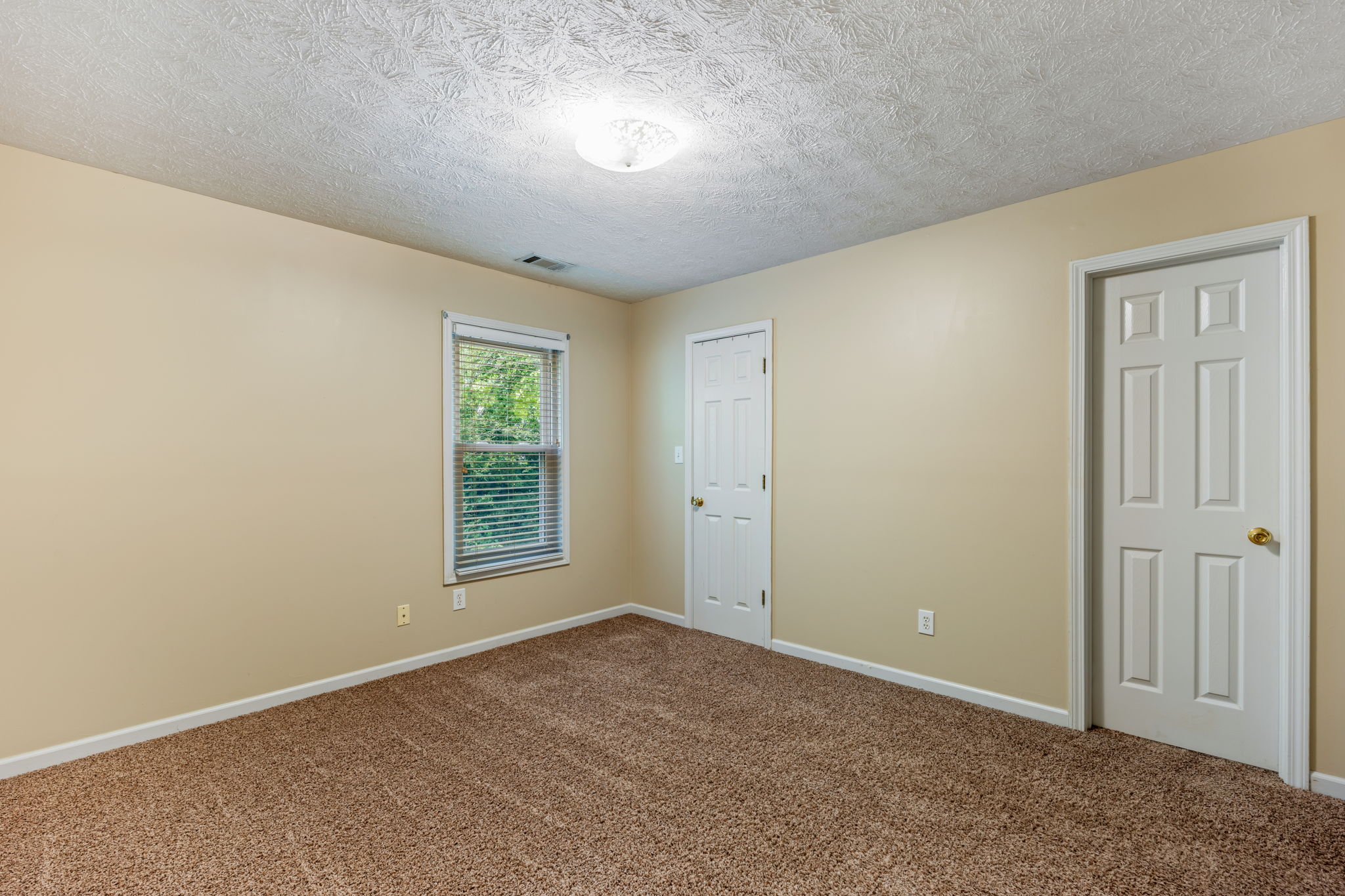 Bedroom #2 with attached Full Bathroom