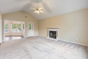 Living Room with Wood Burning Fireplace