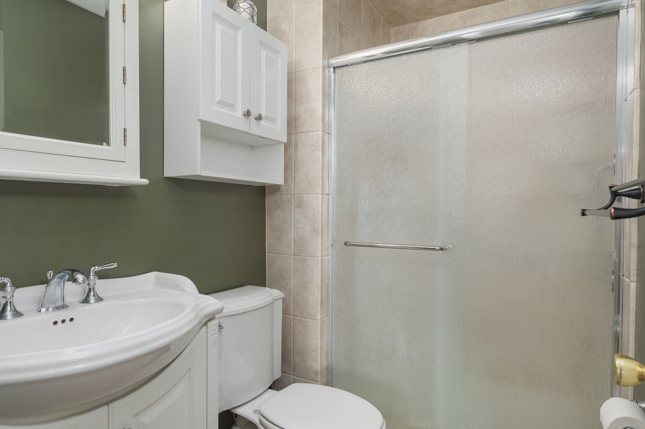 En-suite bathroom connected to the primary bedroom.