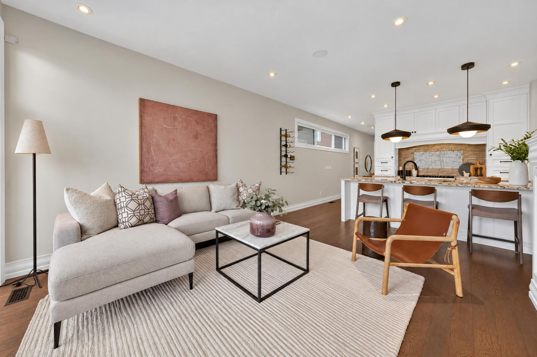 Open living room flowing into the kitchen