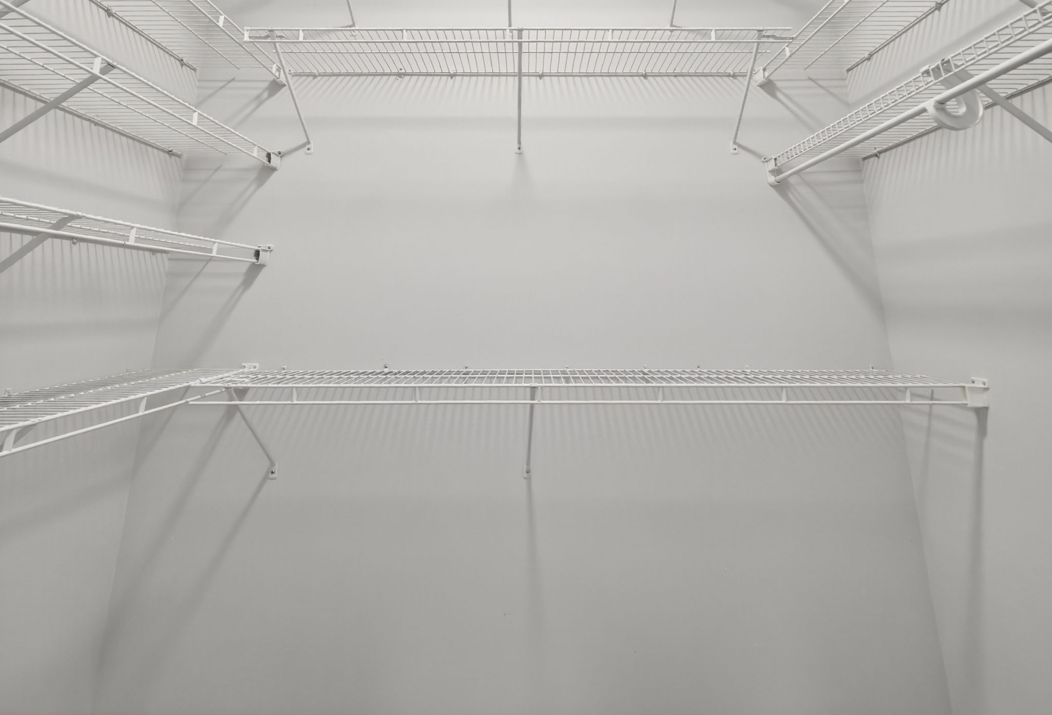 Primary Bedroom First Walk-In Closet