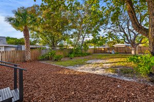 Fully Fenced Backyard-Alley Access