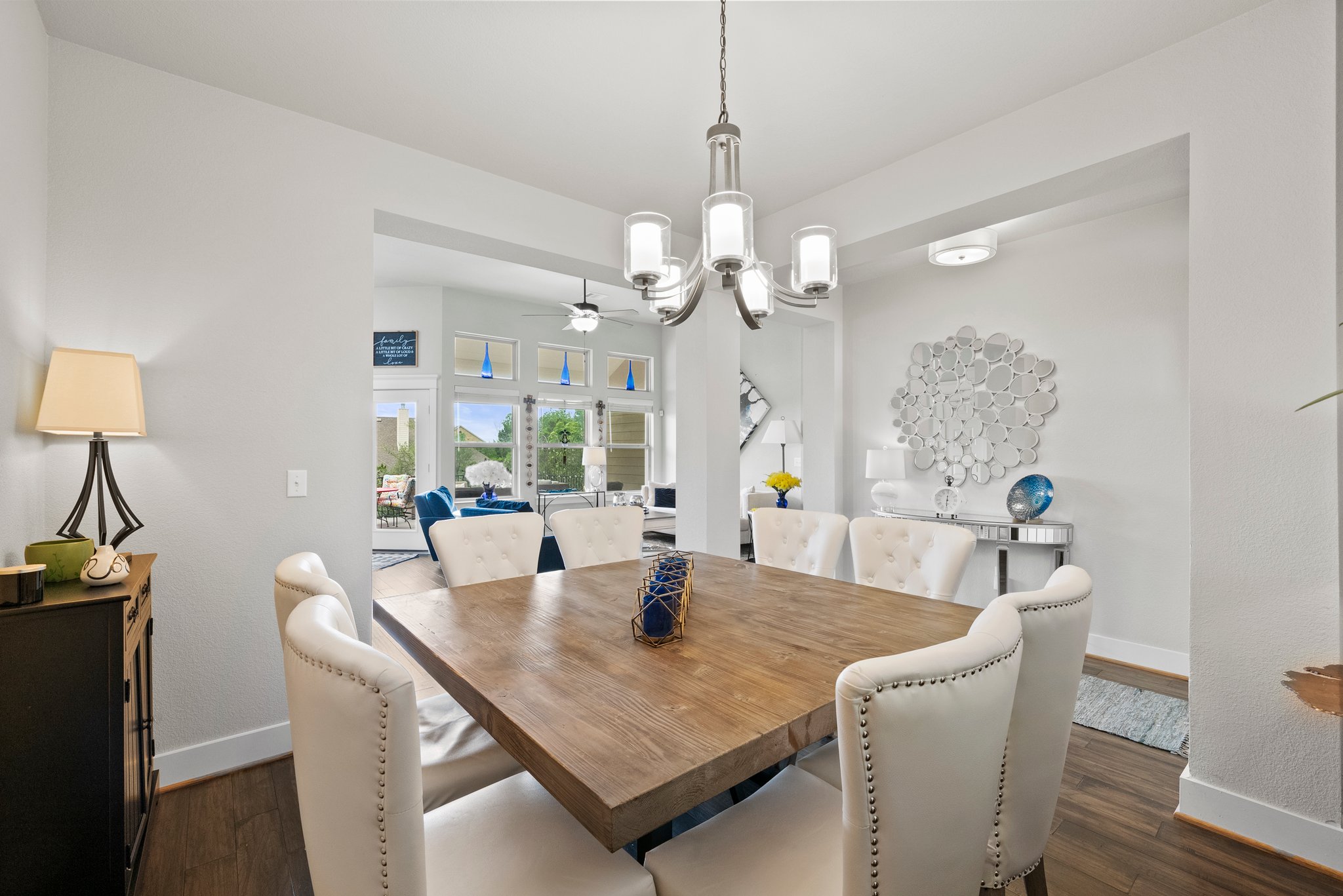 Dining area with 8 chairs.