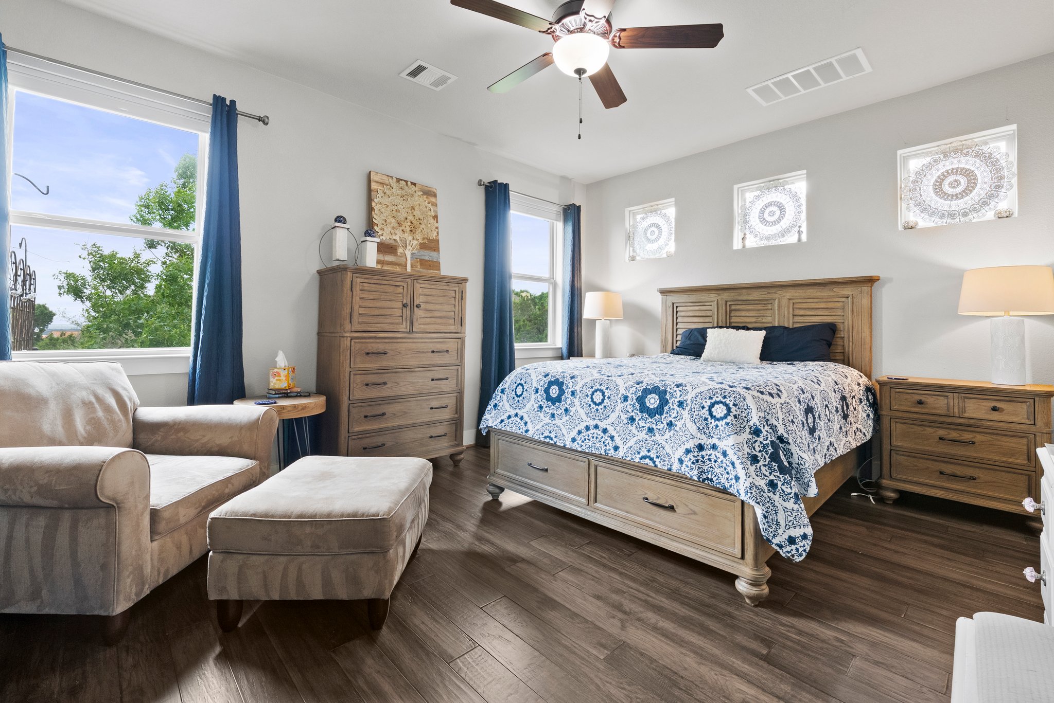 Primary bedroom at the back of the house with hill country views.