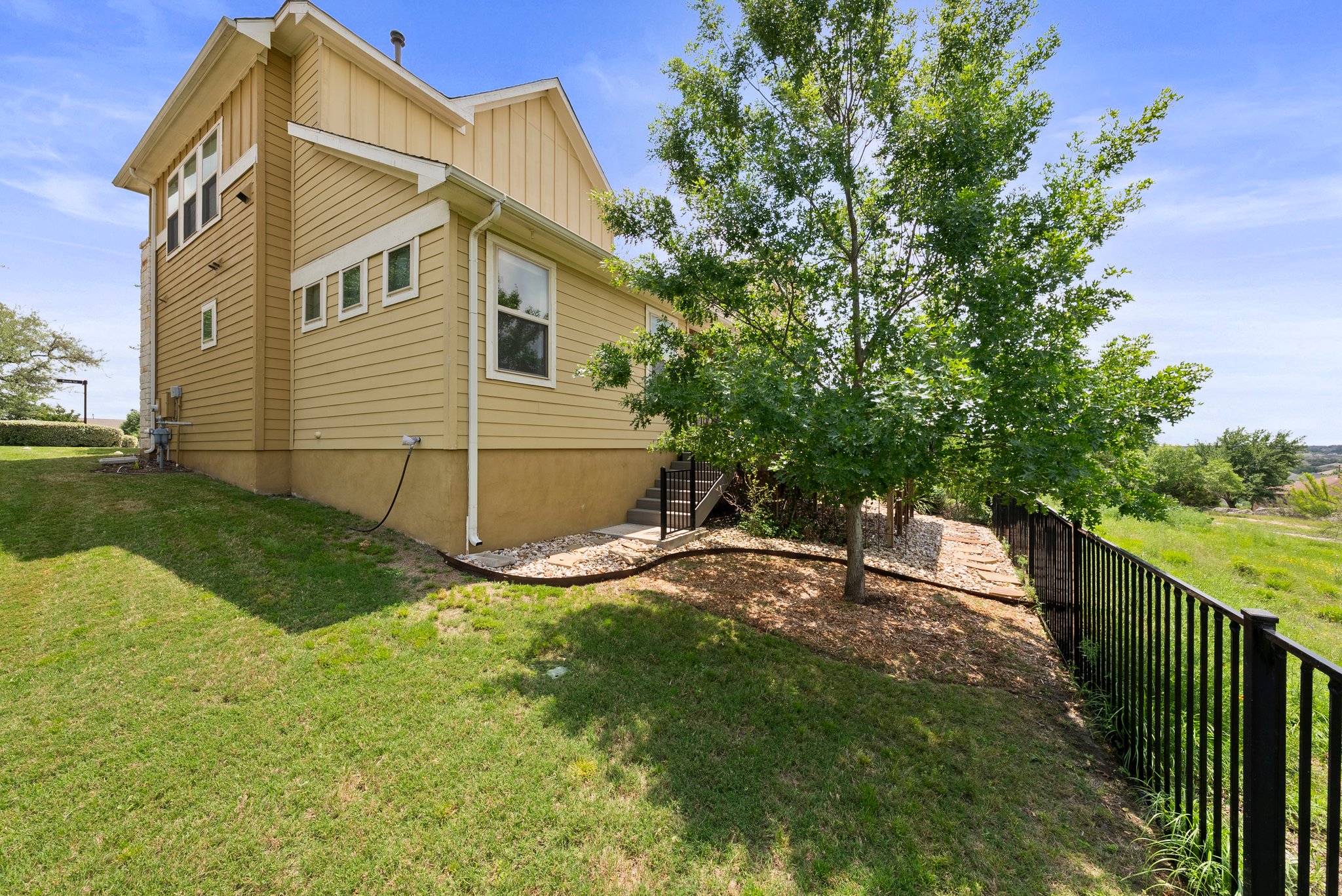 Steps from the porch to the yard.